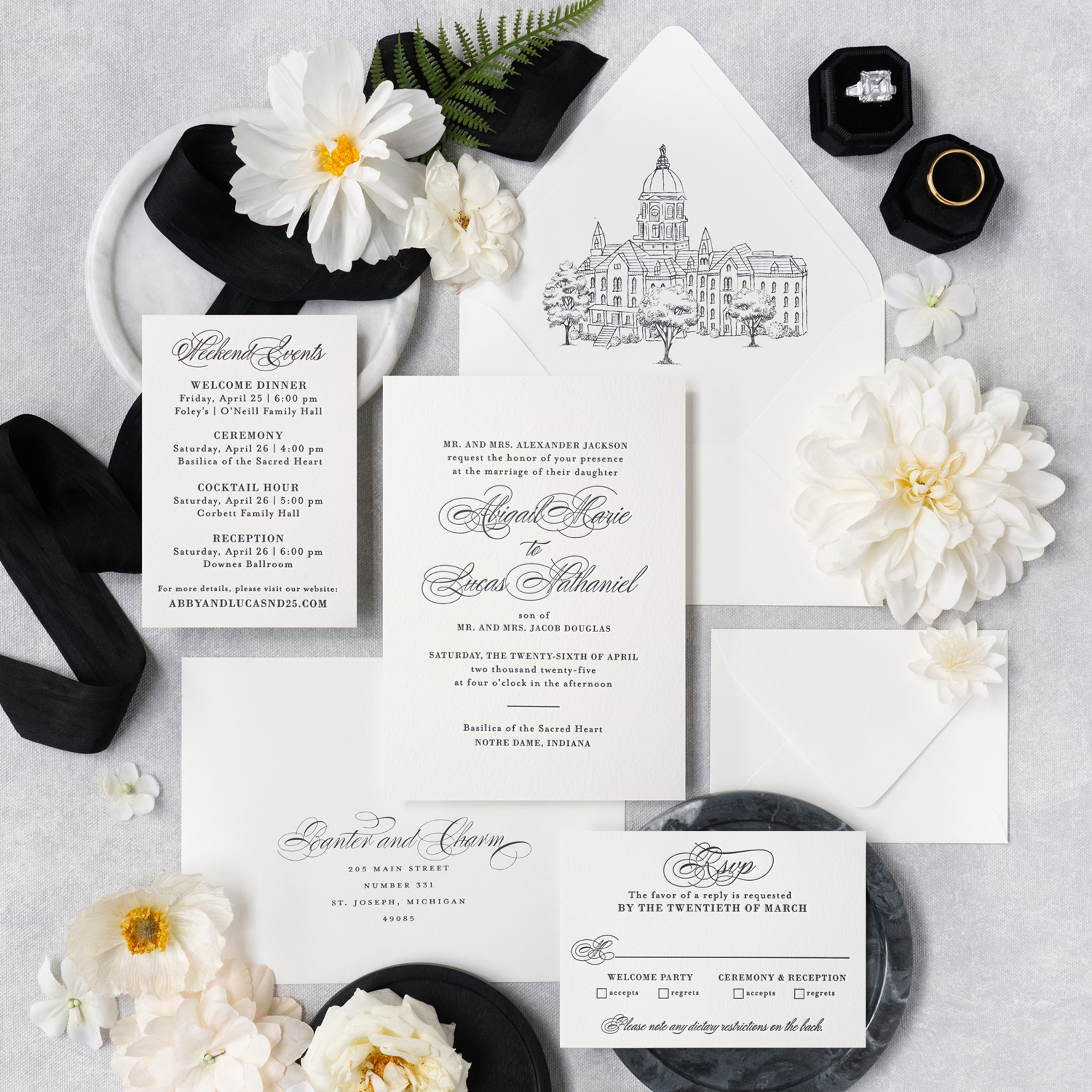 black letterpress wedding invitation with venue sketch envelope liner