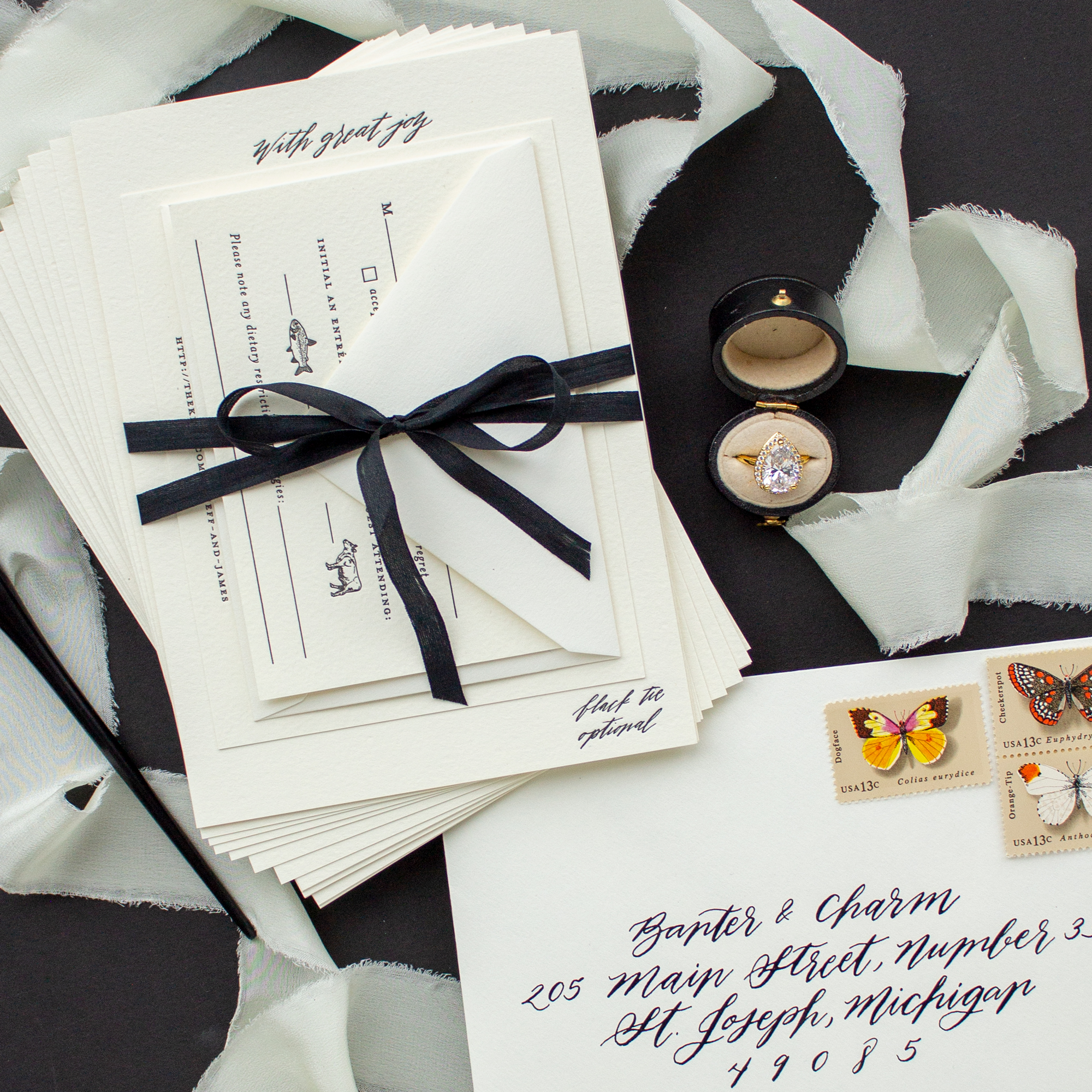 black and ecru calligraphy wedding invitations