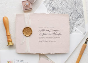 wedding invitations with wax seals and silk ribbon