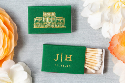 custom matchboxes with venue sketch and wedding monogram