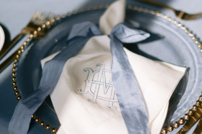 Napkin embroidered with monogram; photo by Erika Aileen Photography