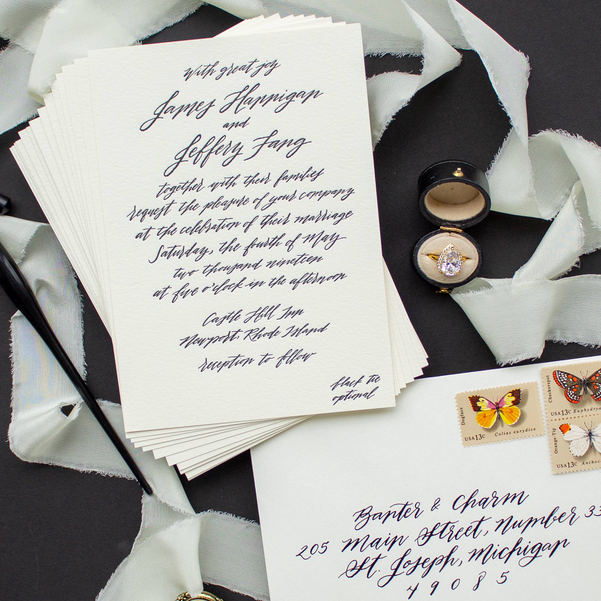 formal wedding invitation with modern calligraphy