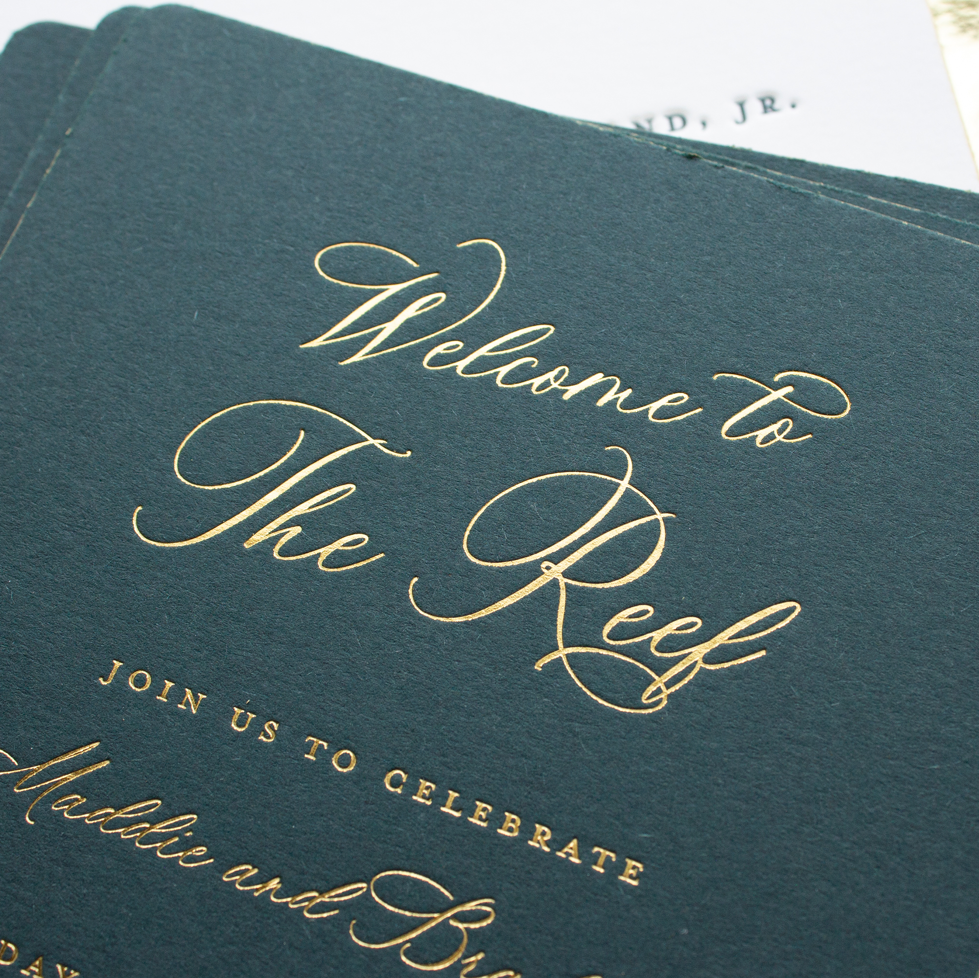 gold foil on pine green paper