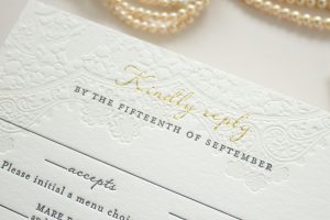 gold foil and blind letterpress reply card
