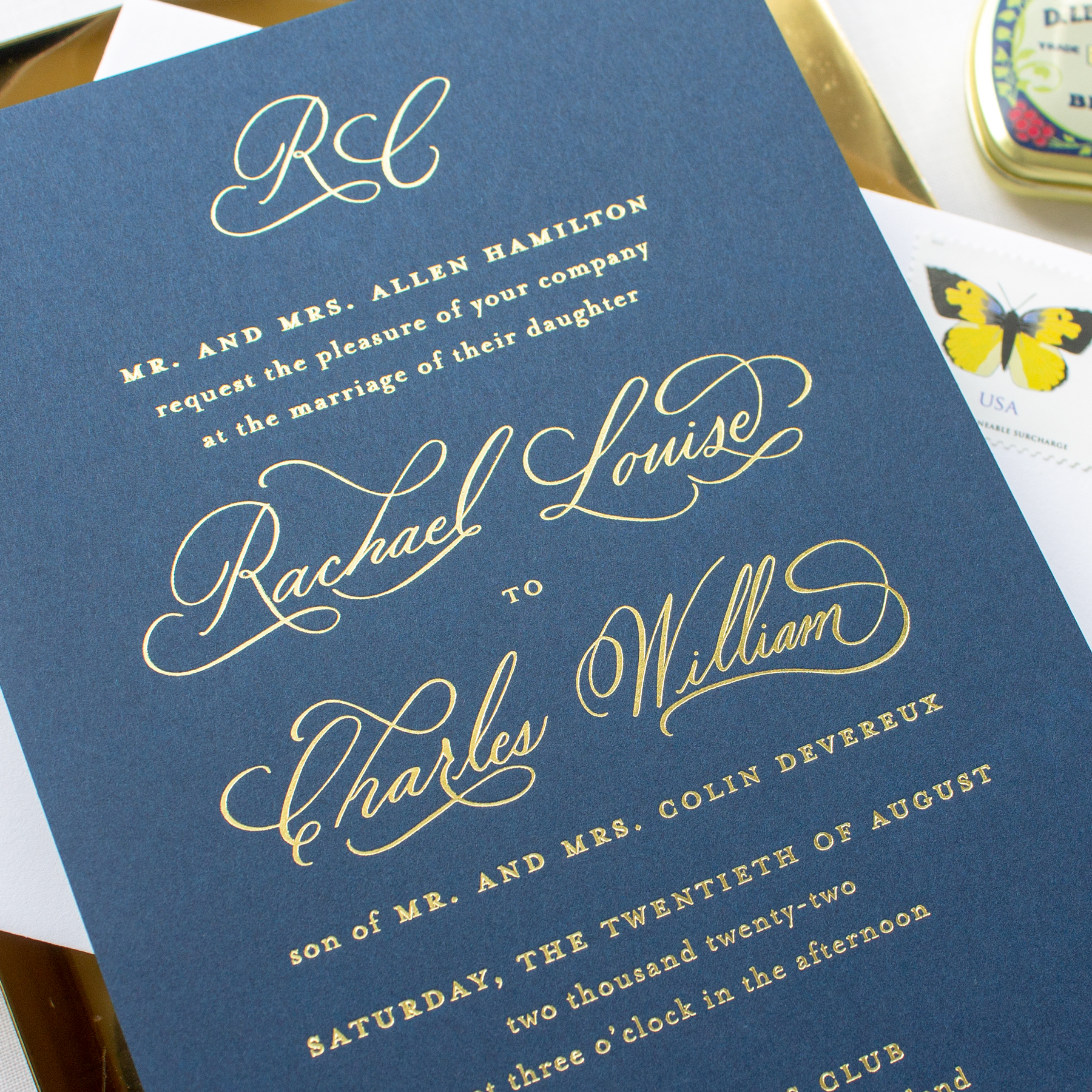 calligraphy wedding invitations in navy and gold